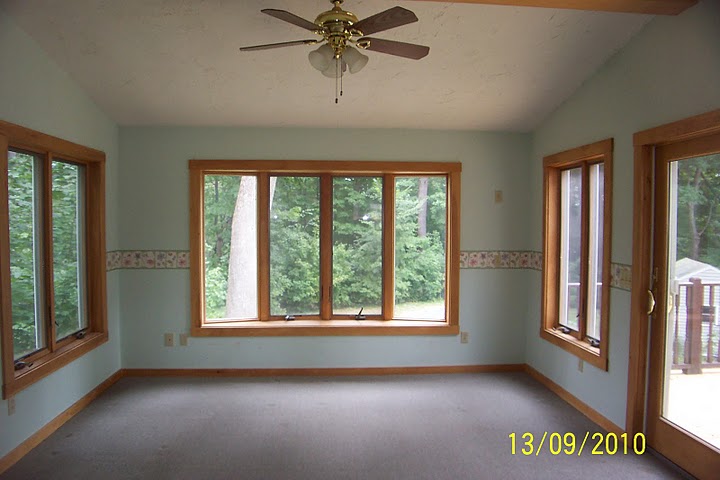Sunroom with french doors to deck