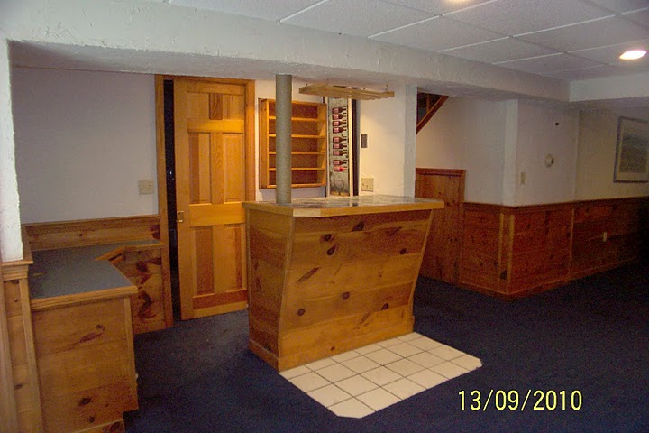 Lower level with bar area and office are