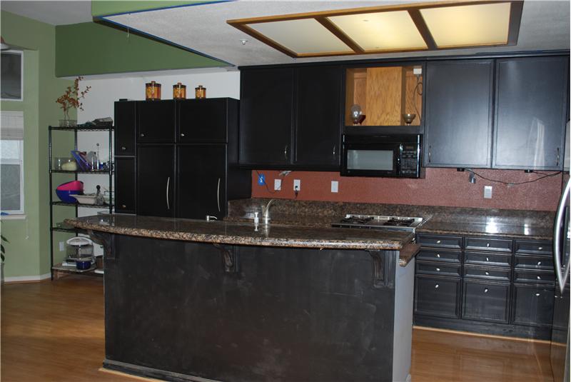 Granite Kitchen Counters/Wood Laminate Floors