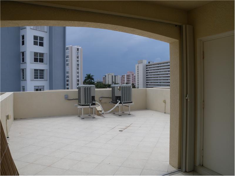 Covered patio allows for dining in the shade