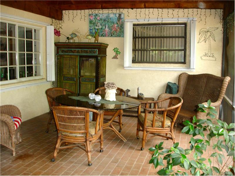 Screened in porch dining