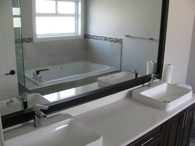 Master ensuite with his and her sinks