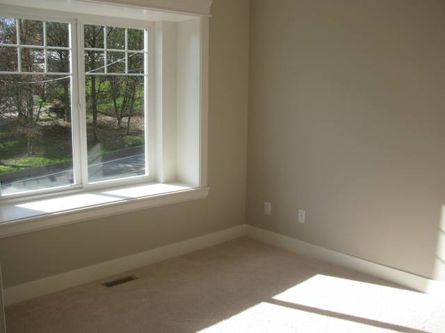 3rd Bedroom with window seat, crown moulding and baseboard