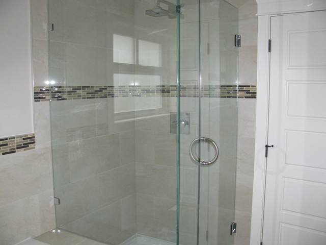 Master with separate shower, square shower head and all glass