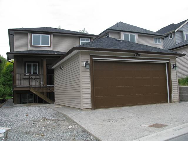 Double detached Garage with lane access and RV parking