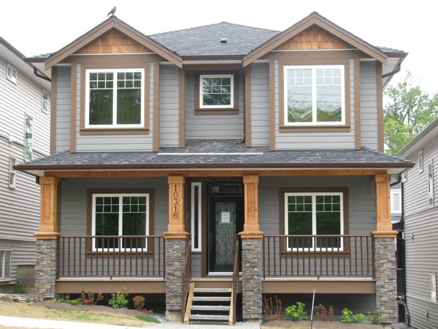 Exterior Front with a fron covered porch