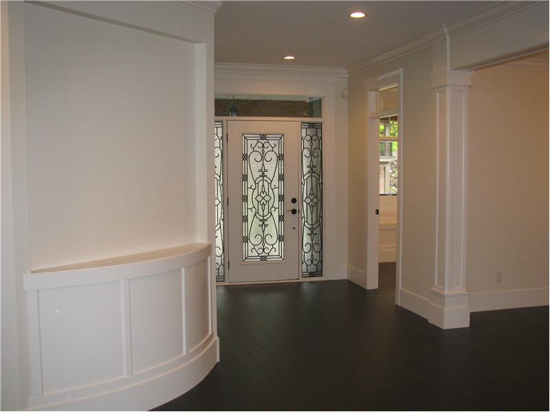 Front Entrance with laminate floor, crown & baseboard