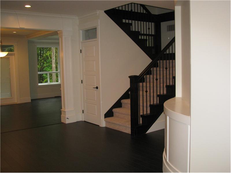 Hallway and stairs leading to the above rooms