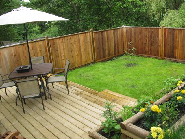 Backyard is terraced and fully fenced