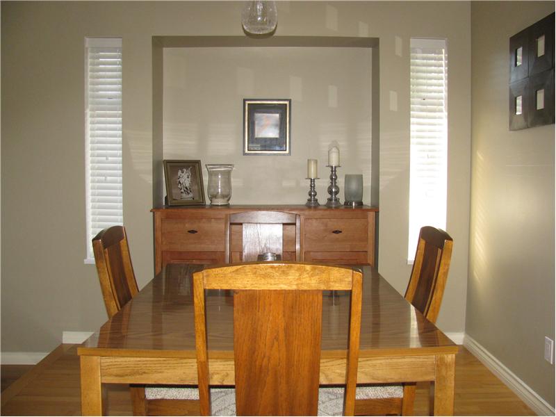Dining has alcove and side windows