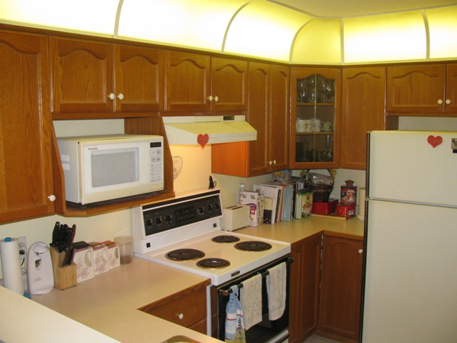 Kitchen with oak cabinets