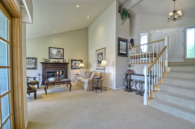 Living room with view of entry landing