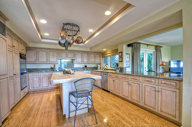 Kitchen with island. oak flooring