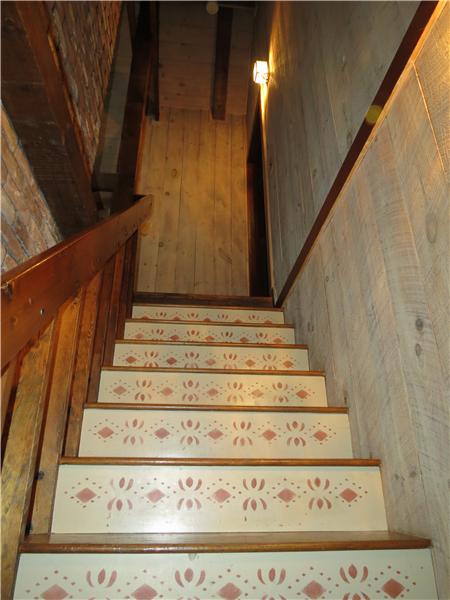 111 Rocky Hill Rd stenciled stairs to Master Bedroom