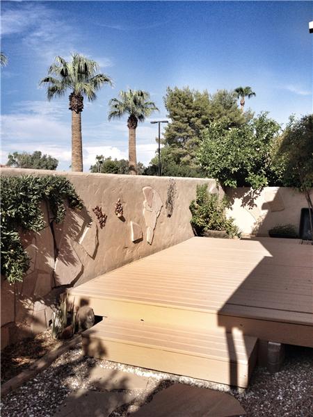 deck on North side of house off of porch