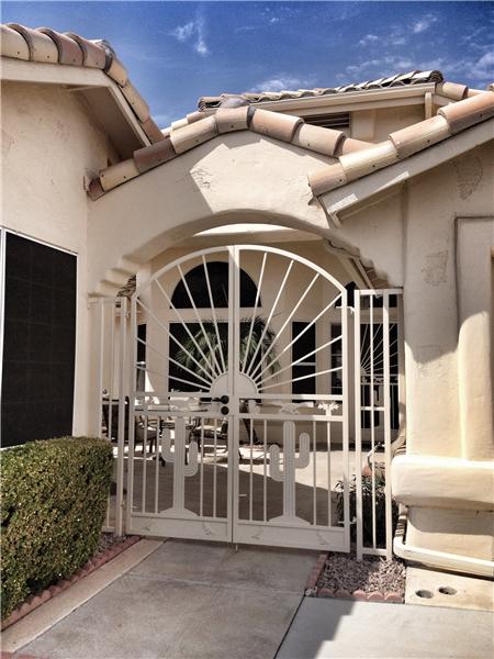 Gated to front court yard- guest house left